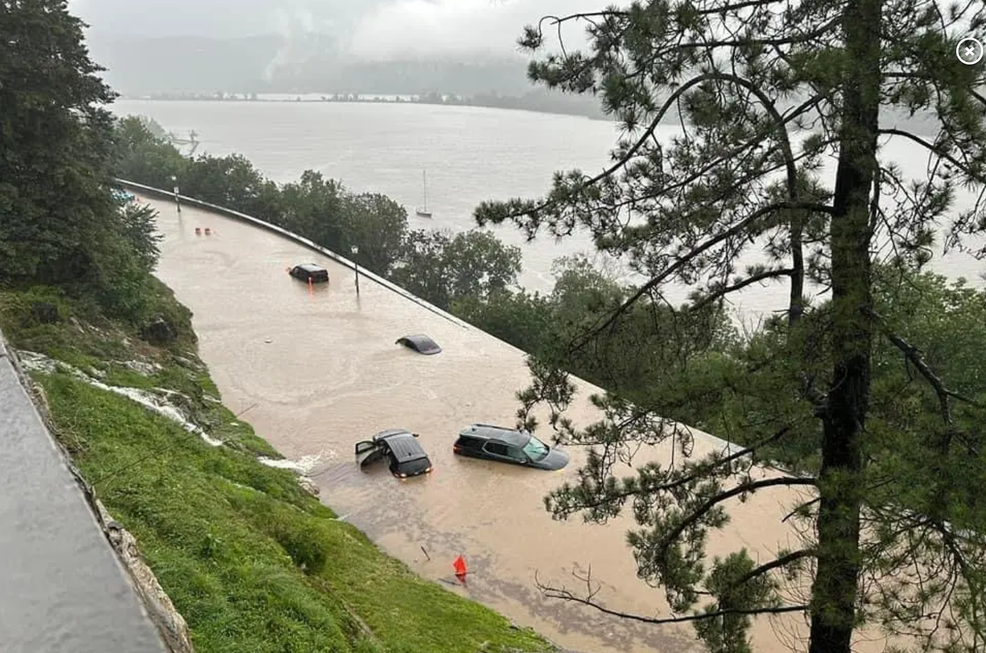 flood-damaged-street-with-cars Flood-damaged street with washed out cars