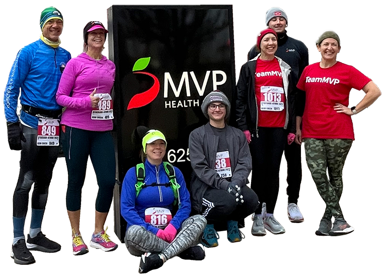Group of MVP employees posing after a run