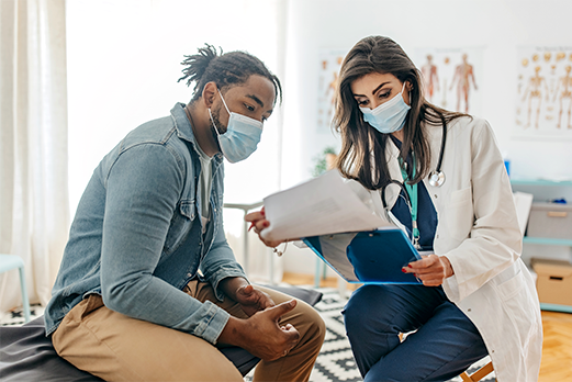 Doctor reviewing information with patient