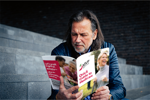 16331633-Quick-Guide-521x348 Man reading MVP brochure