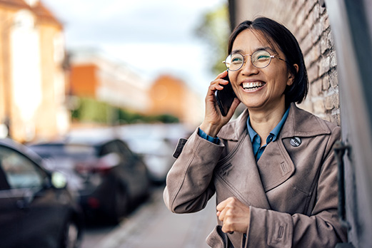 Women on the street talking on cell phone