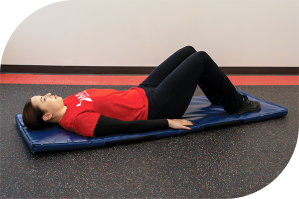 Lie on your back with your knees bent and your feet flat on the floor