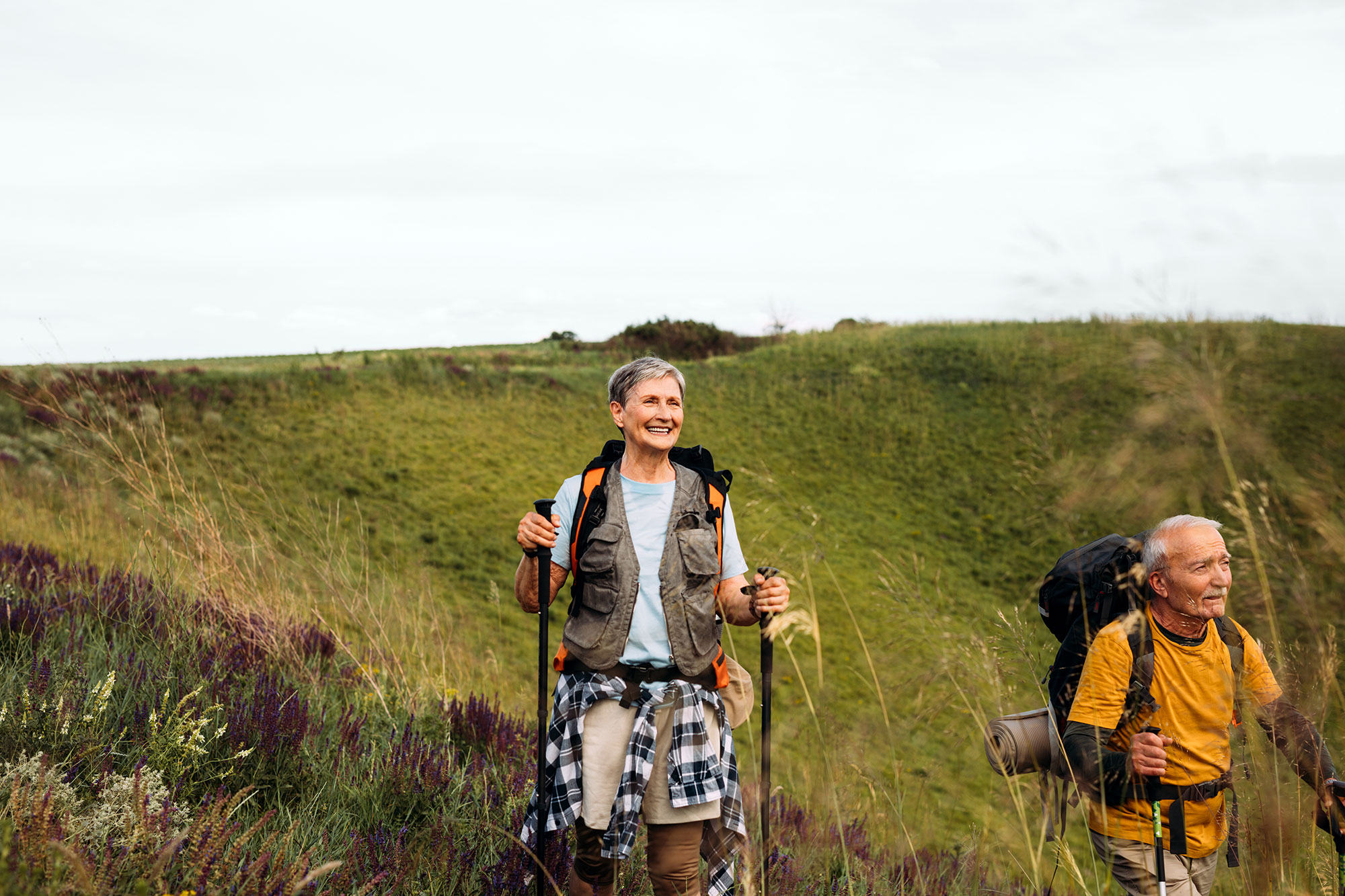 older couple hiking outdoors