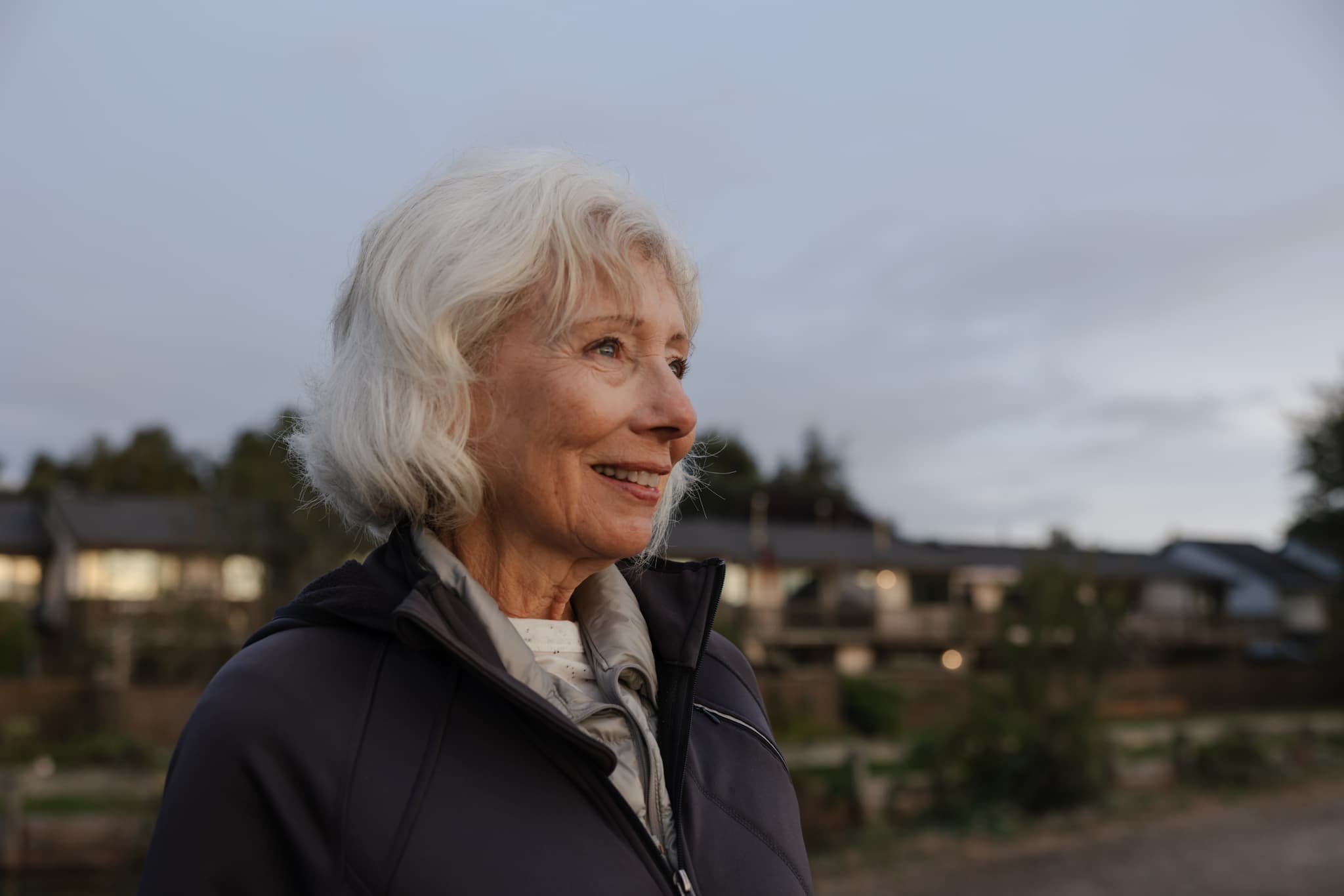 older woman walking at night