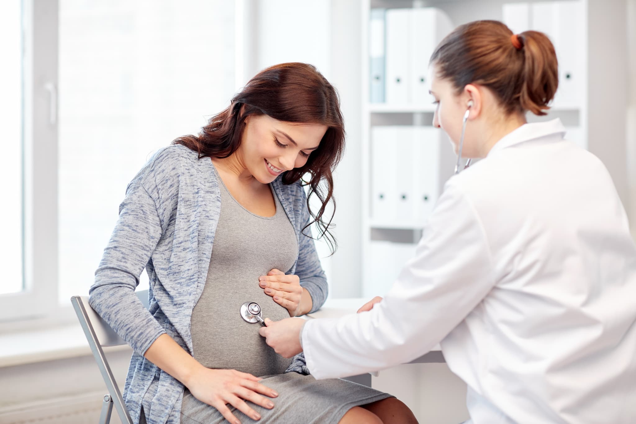 pregnant woman at doctor visit
