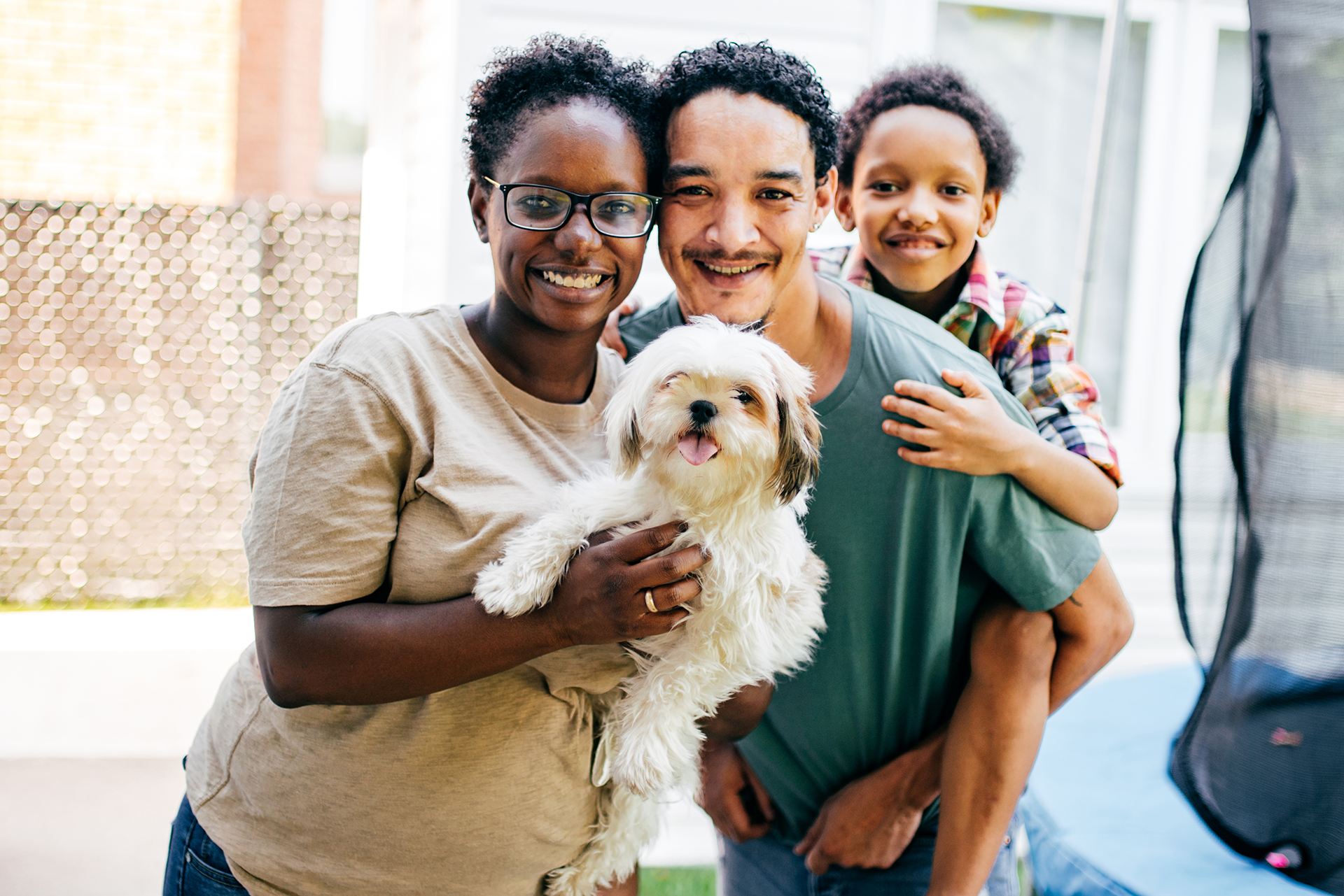 happy family benefiting from essential plan