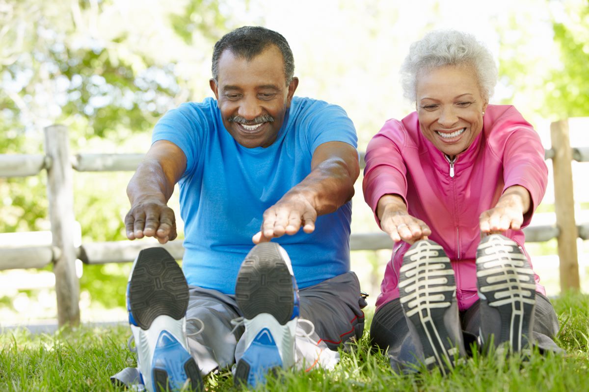 old-poeple-stretching-together-before-exercise old people stretching together before exercise