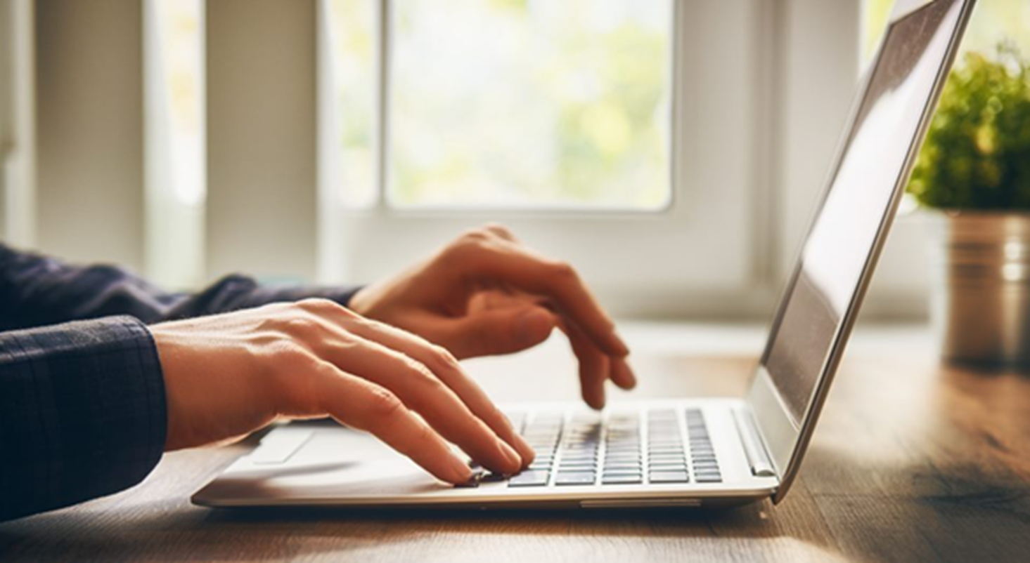 hands-typing-on-laptop hands typing on laptop