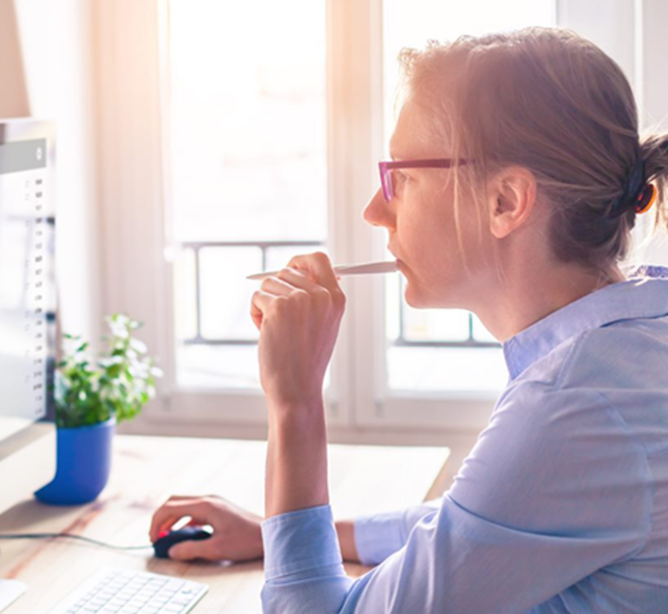 woman-thinking-at-computer woman thinking at computer