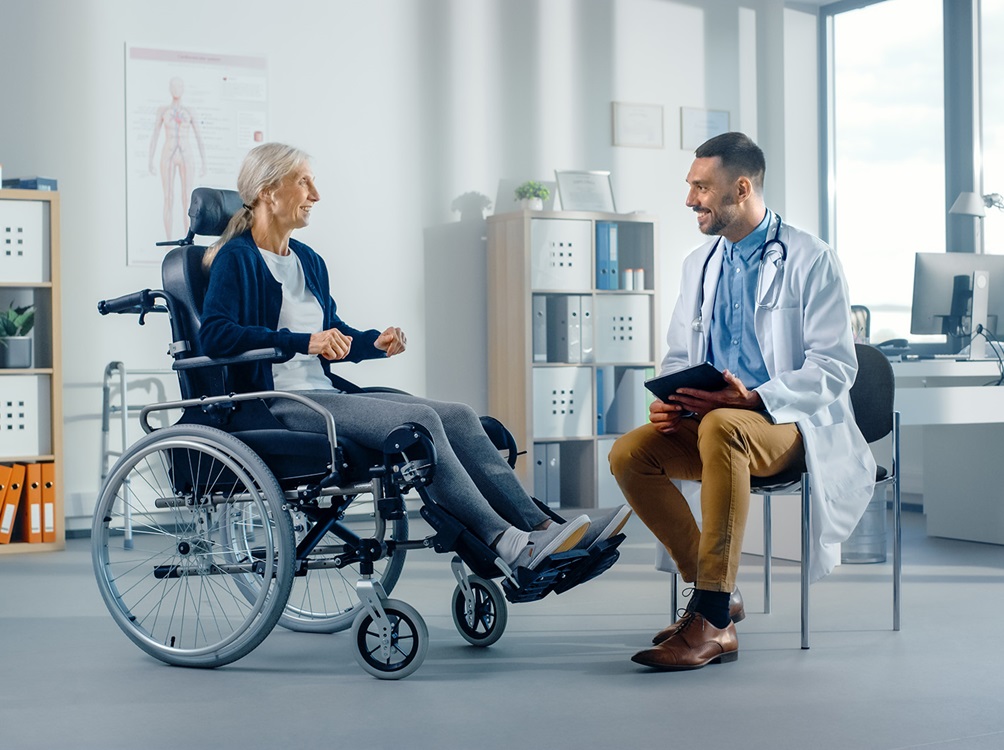 woman wheelchair doctor visit