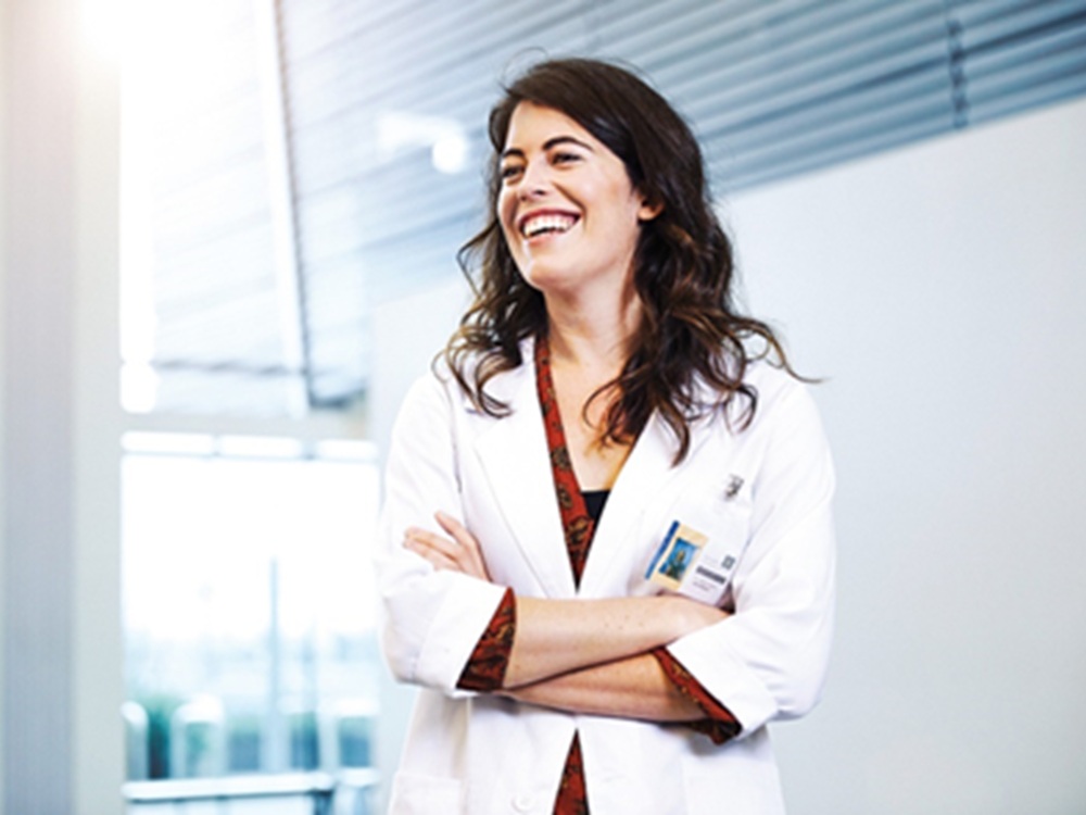 provider smiling with arms crossed