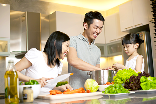 happy family cooking dinner