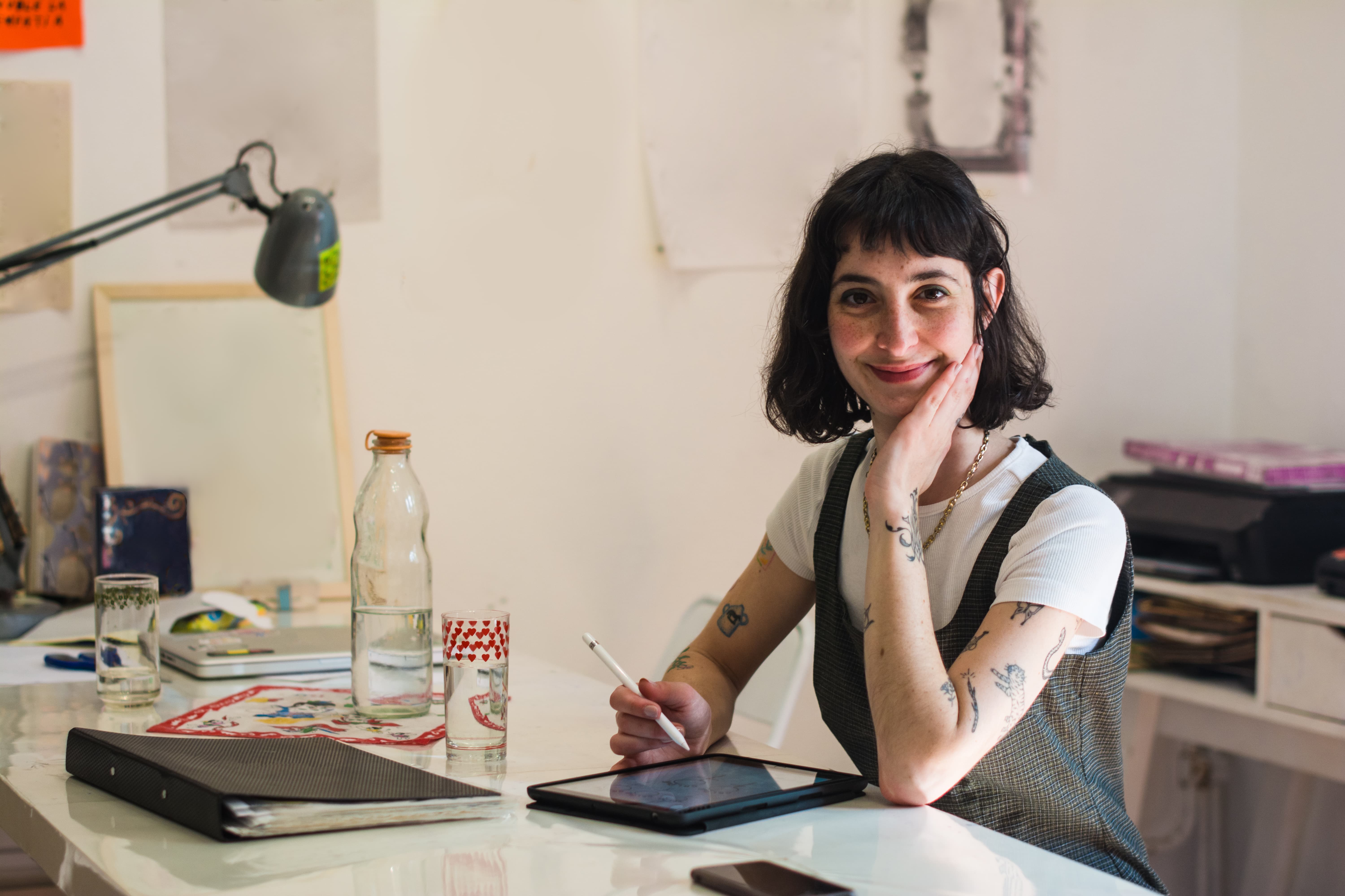 Woman at desk smiling