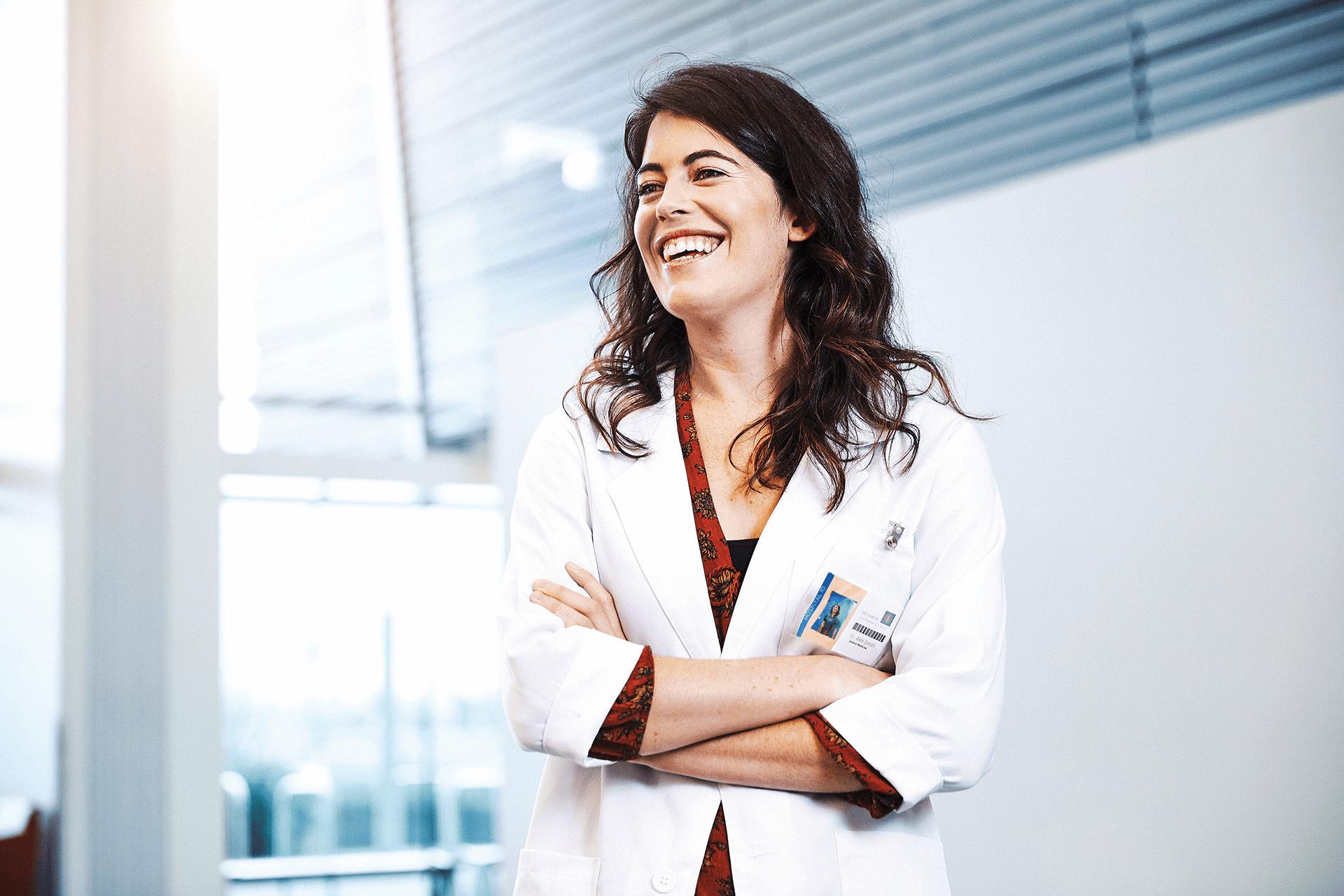 smiling provider with-arms crossed